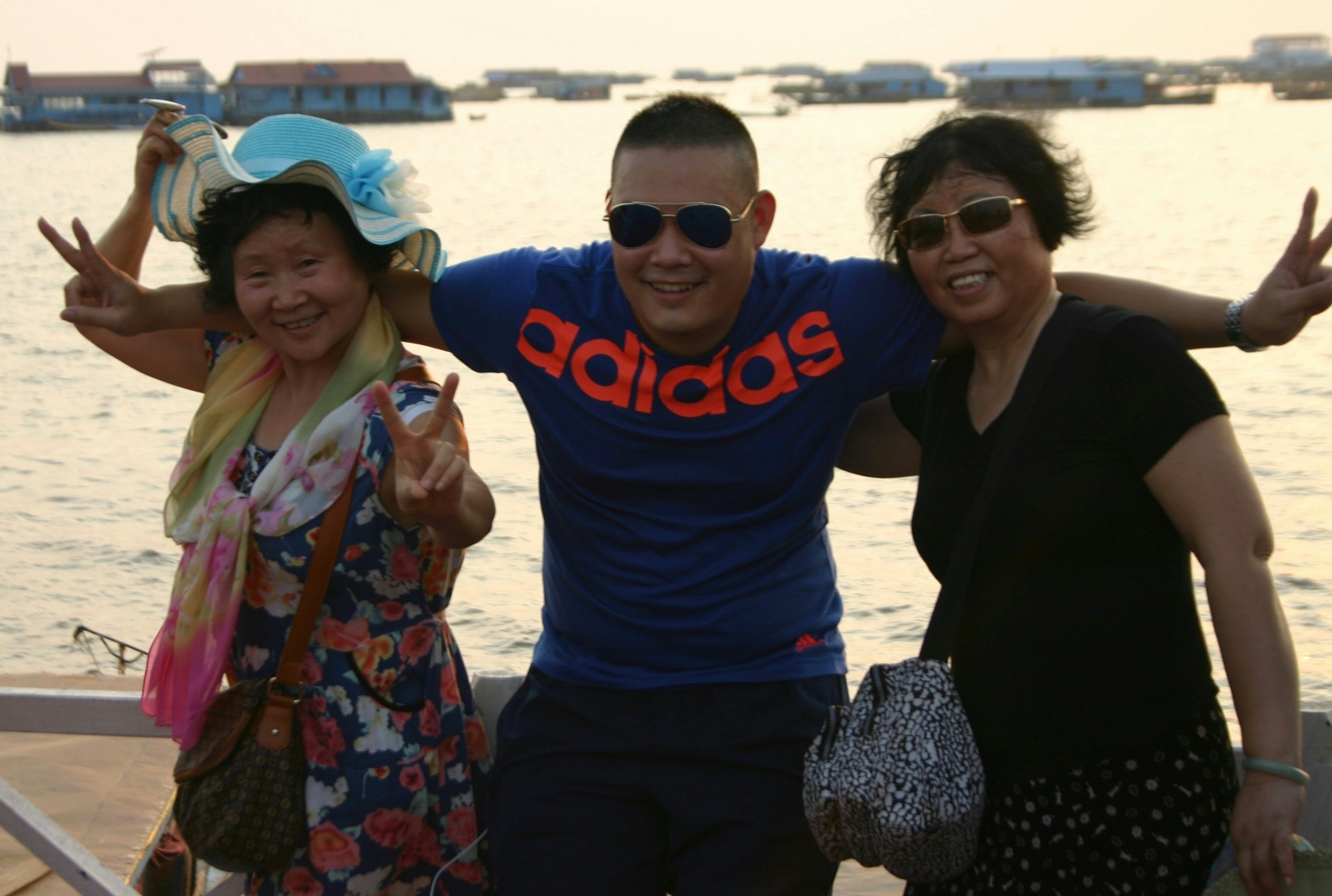 Chinese tourists pose for a photo in Cambodia. (Jing Daily)