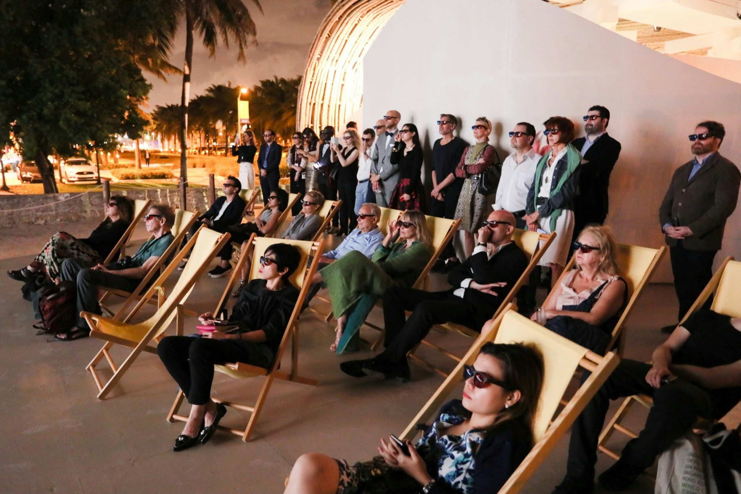 Audience members view Chinese contemporary artist Sun Xun's 3D presentation at an unveiling during Art Basel Miami. (Courtesy Photo)