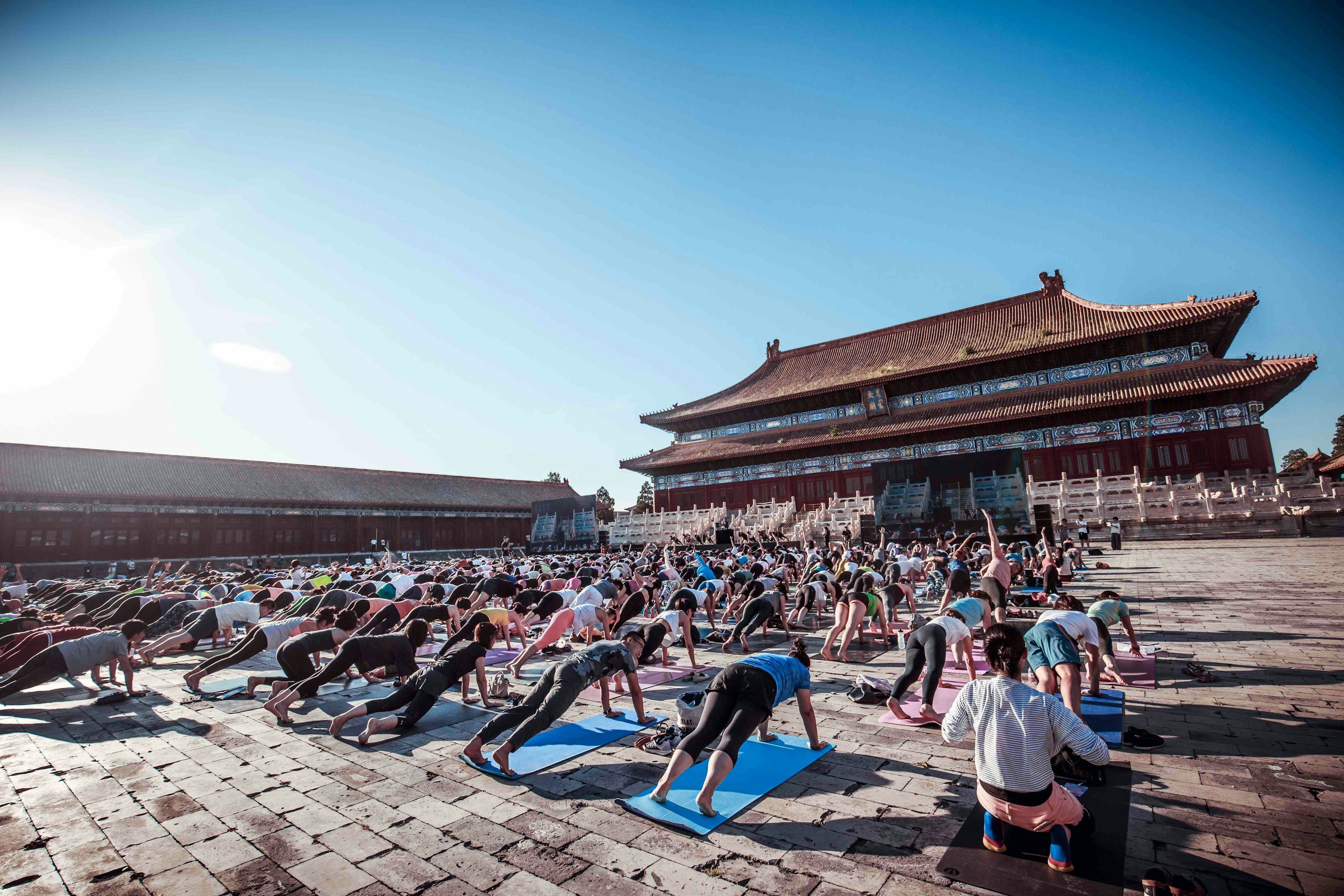 Hundreds of people gathered at the Forbidden City for Lululemon's Unroll China 2016 event on August 28. (Courtesy Photo)