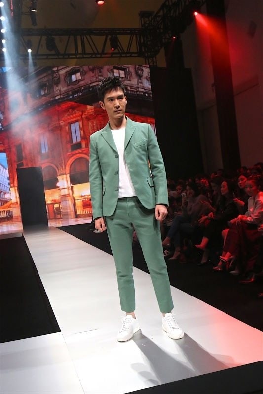 Actor Yilun Sheng models a look at the runway show. (Courtesy Photo)