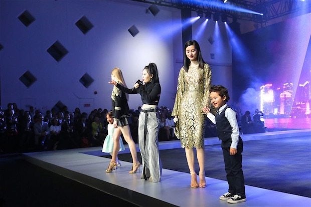 Singer Tia Ray performs at Tmall's live-streamed runway show promoting its new luxury channel with Mei.com. (Courtesy Photo)