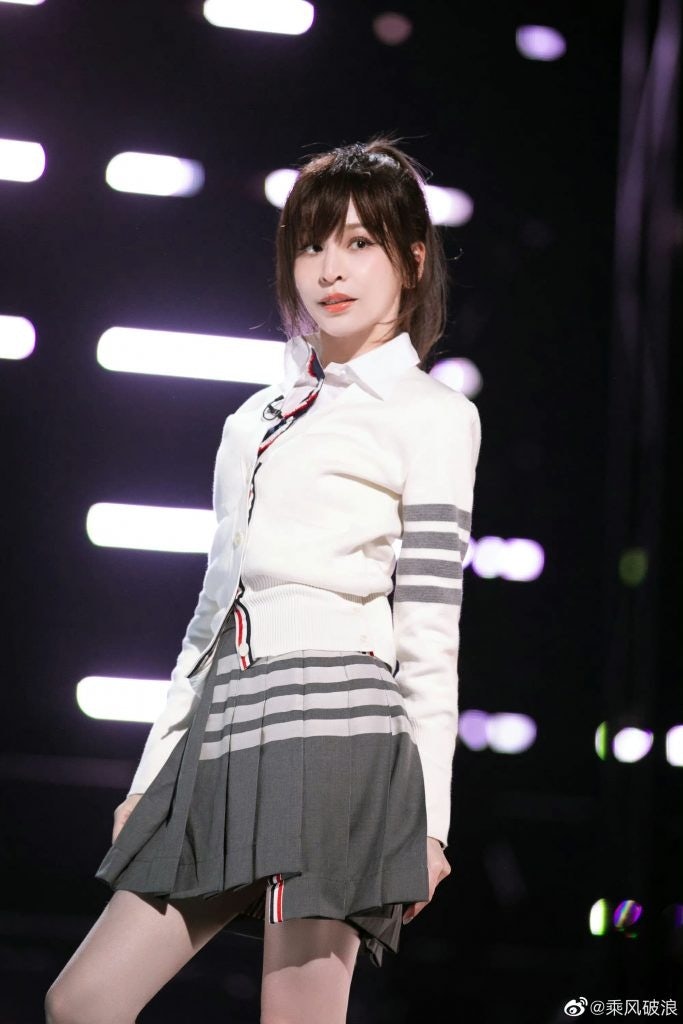 Cyndi Wang dressed in Thom Browne for the performance of her 2004 hit song, "Love You." Photo: Sisters Who Make Waves' Weibo