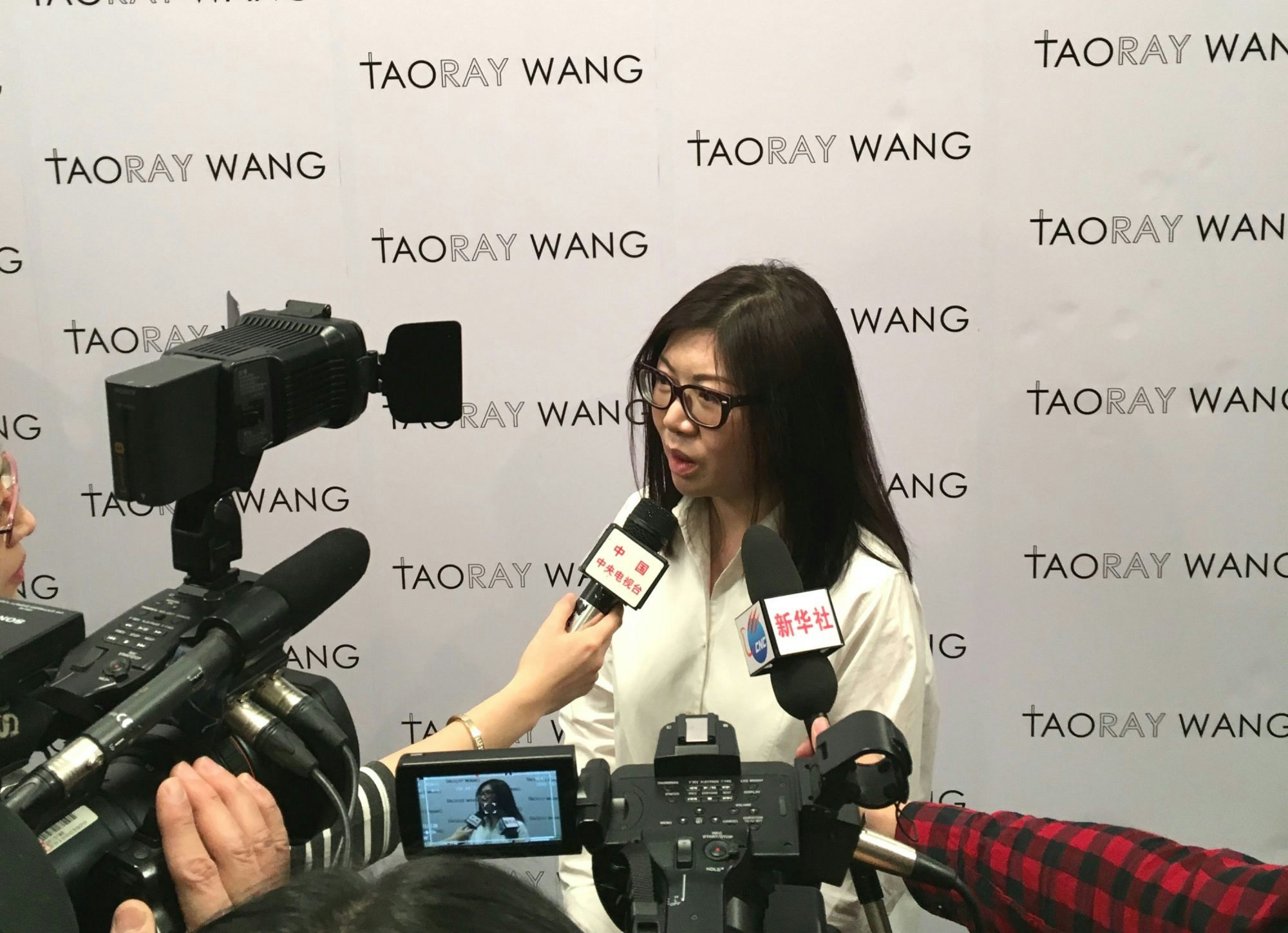Tao Wang, the designer behind Taoray Wang, takes questions from media after her Fall/Winter 2017 collection debut at New York Fashion Week. (Philip Zhang)