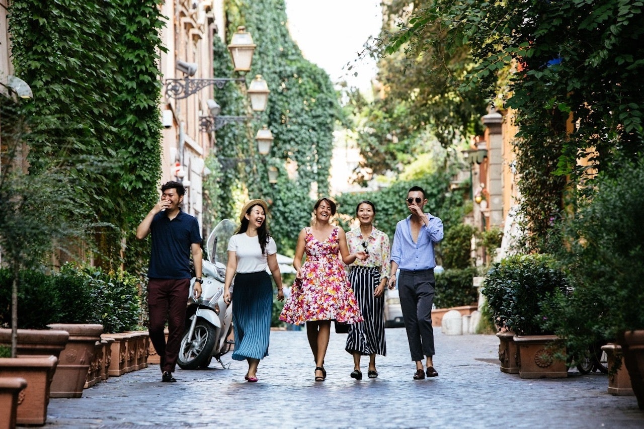 Erica Giopp (center) leads bespoke tours for high-end Chinese clients in Italy. Photo by Guido Caltabiano
