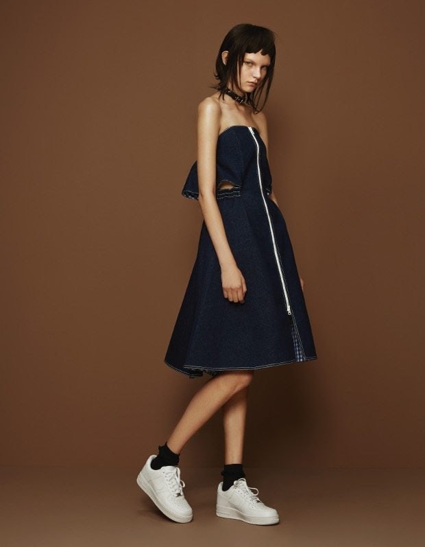A denim off-the-shoulder dress in Shushu/Tong's Opening Ceremony collection. (Courtesy Photo)
