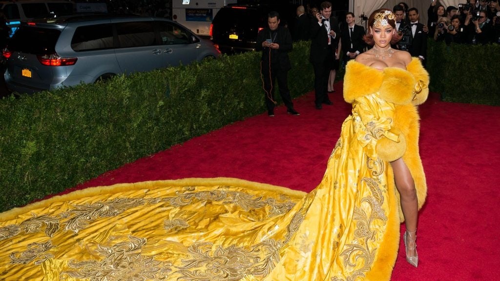 Rihanna's outfit to the 2015 Met Gala was a 55-pound dress with a 16-foot train designed by Chinese couturier Guo Pei. Photo: Shutterstock