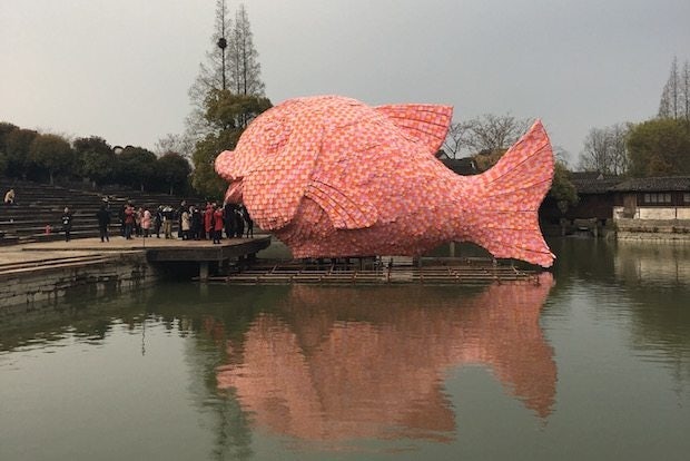 Floating Fish by Florentijn Hofman in Wuzhen's water amphitheater for the "Utopias/Heterotopia" exhibition. (Jing Daily)