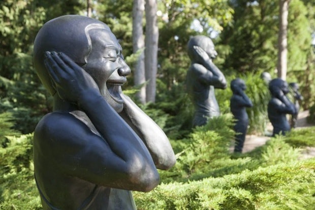 25 of Yue Minjun's Warriors are installed at LongHouse Reserve in East Hampton (Image: GalleristNY)