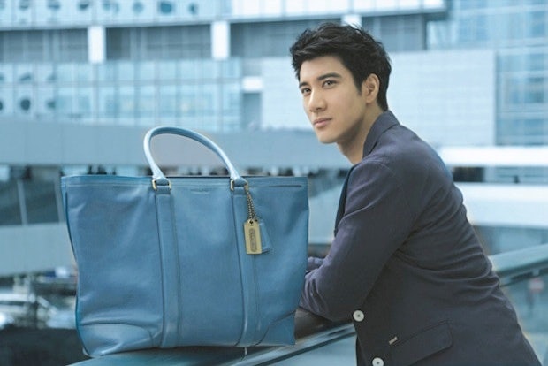 Taiwanese actor Wang Lee-Hom appears in a Chinese ad for Coach, an American brand known for tapping into accessible luxury demand. (Visit Beijing)