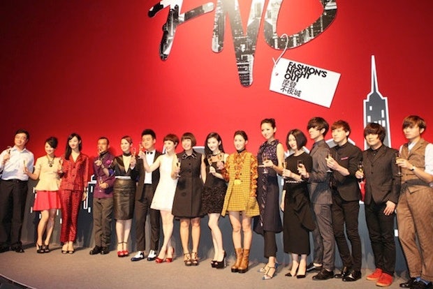 Vogue China Editor-in-chief Angelica Cheung poses with top China fashion figures at last year's Fashion's Night Out. (Vogue China)  
