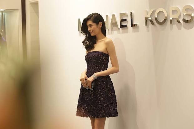 Model Ming Xi makes an appearance at the Michael Kors opening in Beijing. (Michael Kors/Facebook)