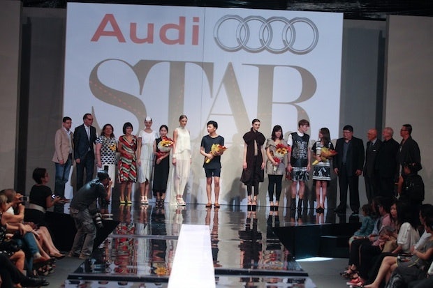 Roderic Wong (C) receives the Audi Star Creation Award