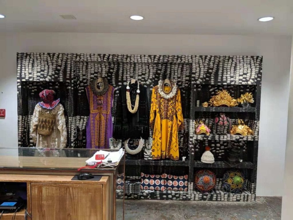The wall displays include hand-crafted pieces from folk artists from all over the world. Photo: Jing Daily