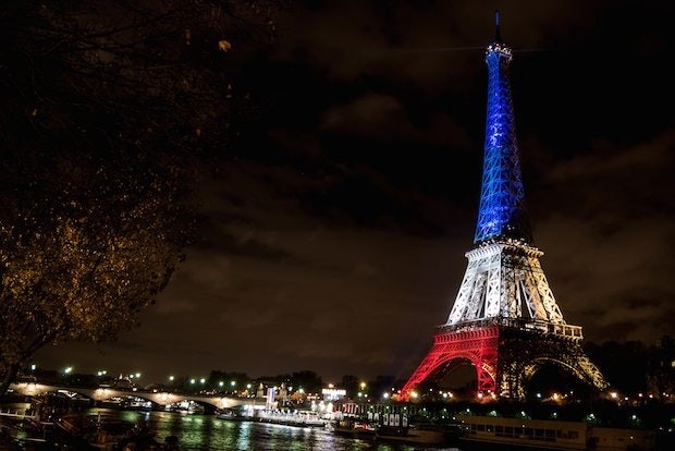 The Eiffel Tower illuminated with the colors of the French flag following the recent terrorist attacks in Paris. (Flickr/la_bretagne_a_paris)