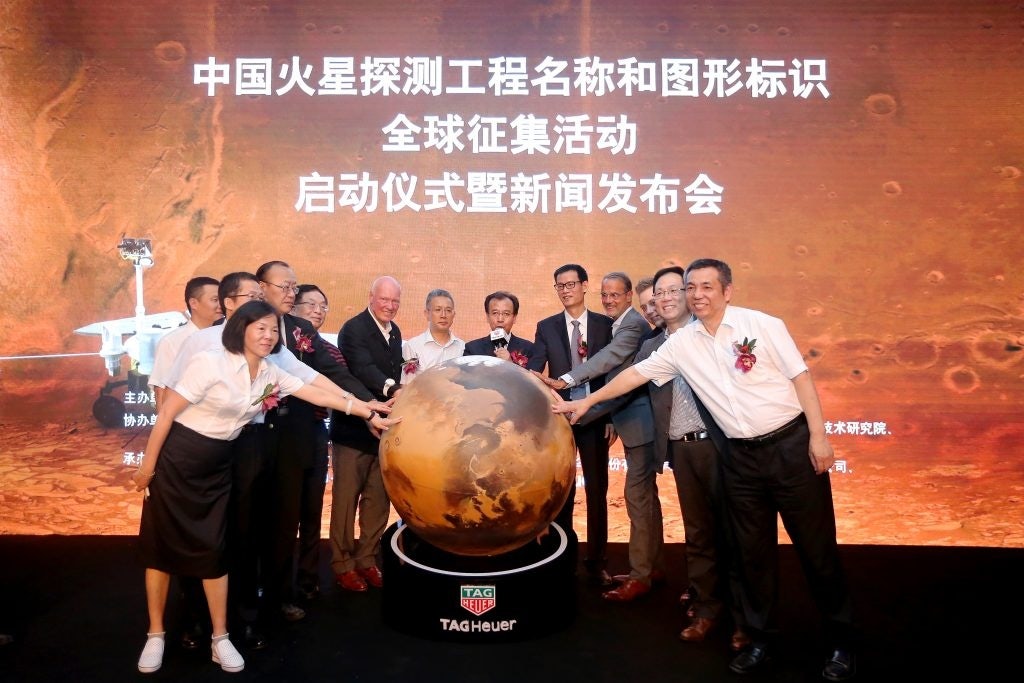 Jean-Claude Biver with China National Space Administration project leaders at an event celebrating TAG Heuer's selection as the official timekeeper of China’s Mars Exploration Program. (Courtesy Photo)