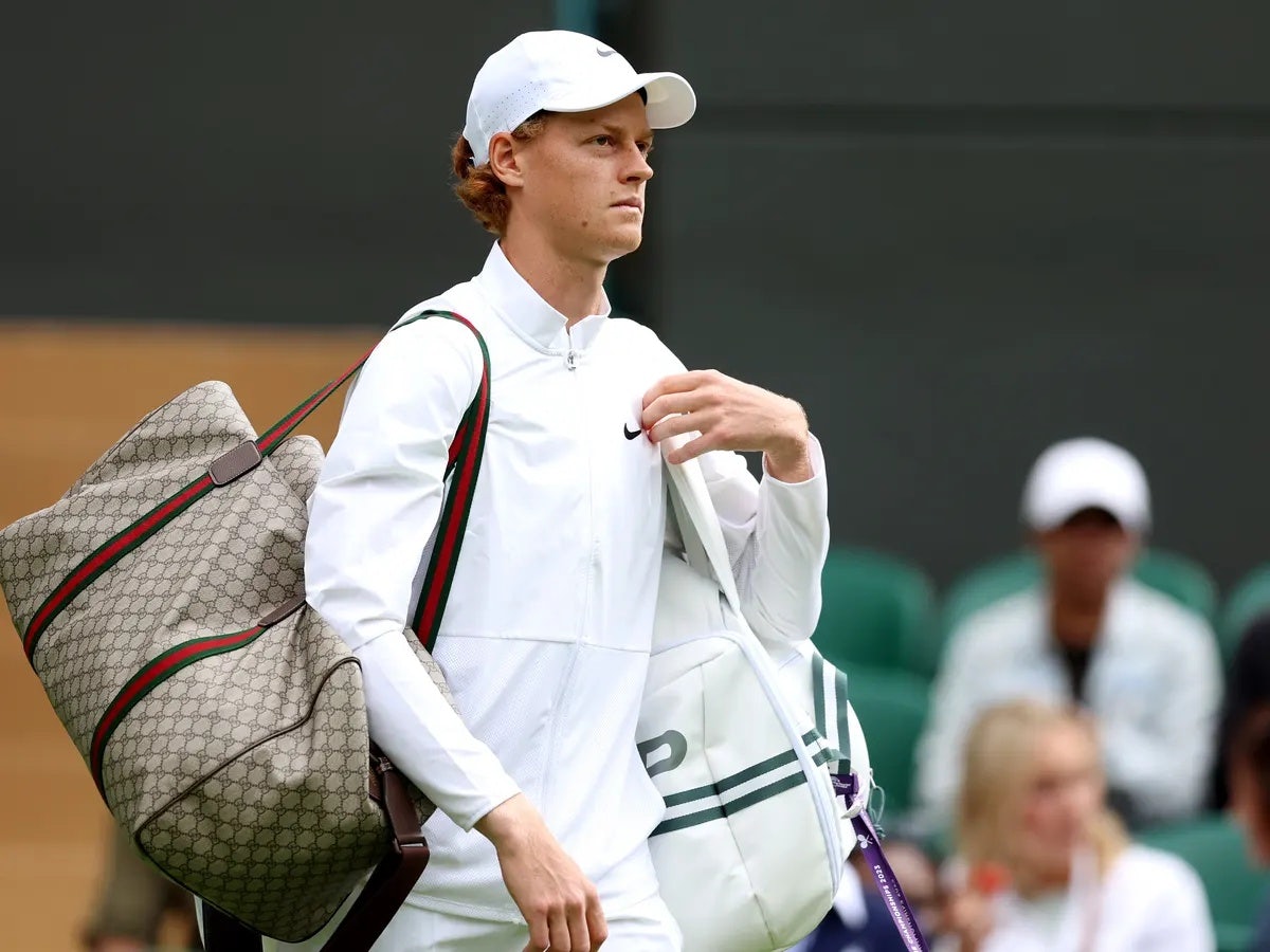 Jannik Sinner broke the rules when he famously stepped out onto the court with a Gucci duffle last year. Photo: CNN