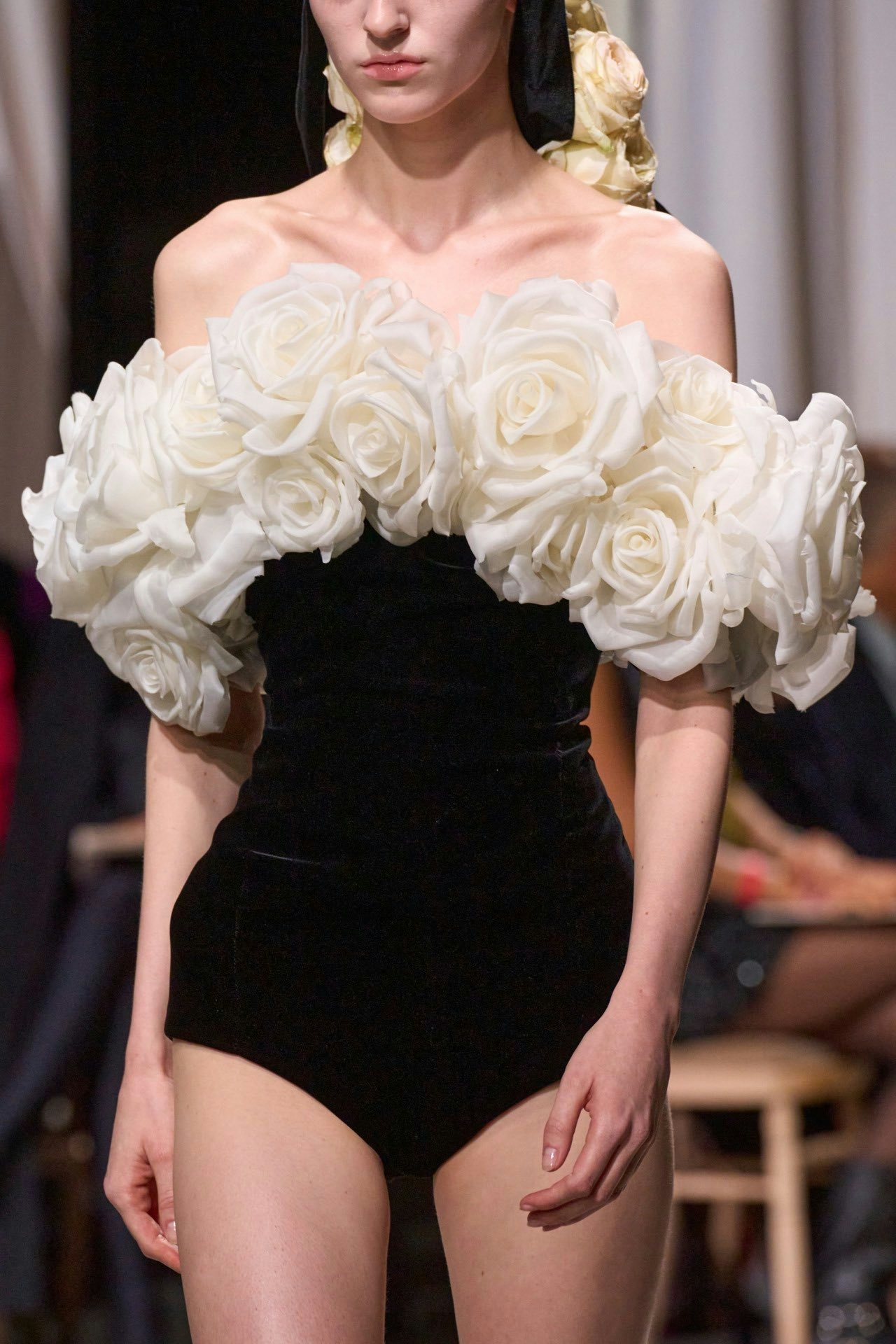 A striking black bodysuit adorned with three-dimensional roses from Giambattista Valli’s 2024 Spring/Summer couture collection. Image: Giambattista Valli