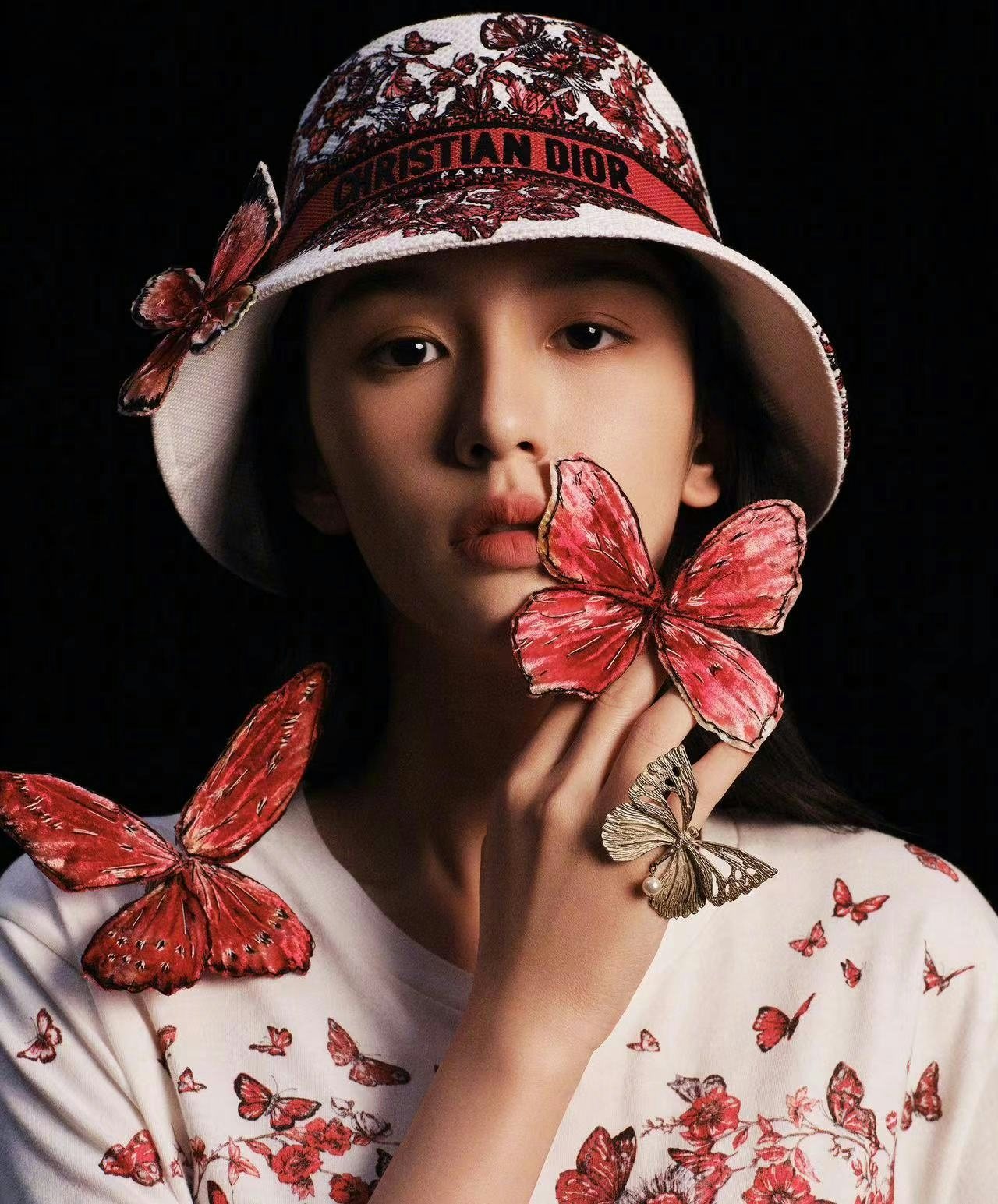 Dior brand ambassador Zhou Ye showcases red-themed limited edition products. Photo: Dior
