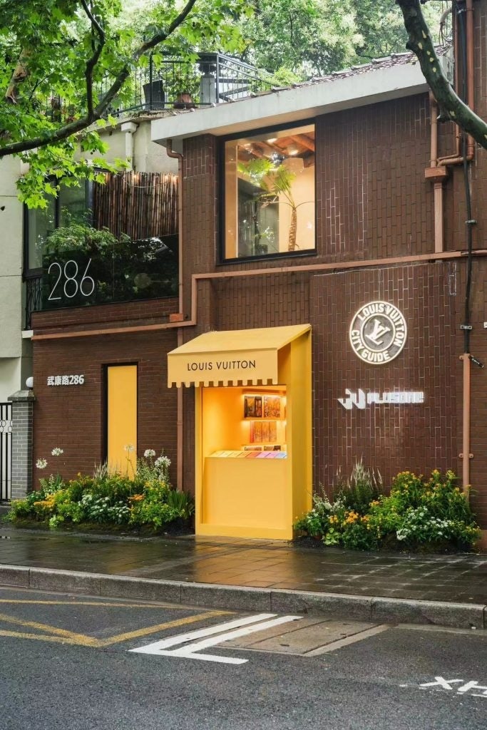 Local coffee shop Plusone was converted into a yellow-themed Louis Vuitton bookstand. Photo: Louis Vuitton