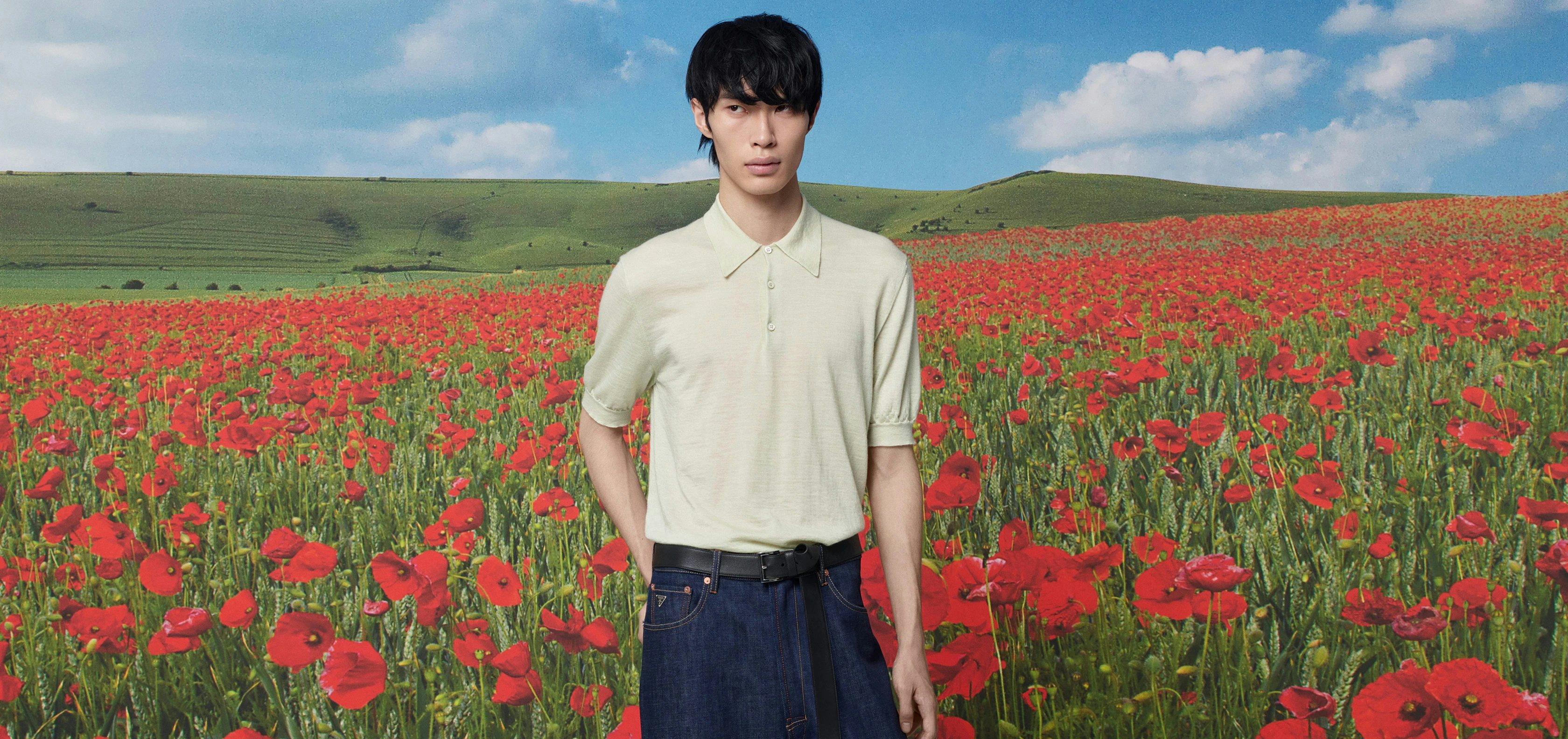 Shot by Marco Lessi, model Zhewei Guo stands in a field of poppies. Photo: Prada
