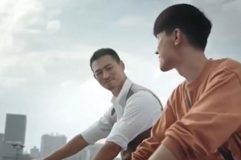 Cartier's Valentine's Day ad faced backlash for labeling a male couple, who viewers believed to be gay, as father and son. Photo: Screenshot from Cartier.