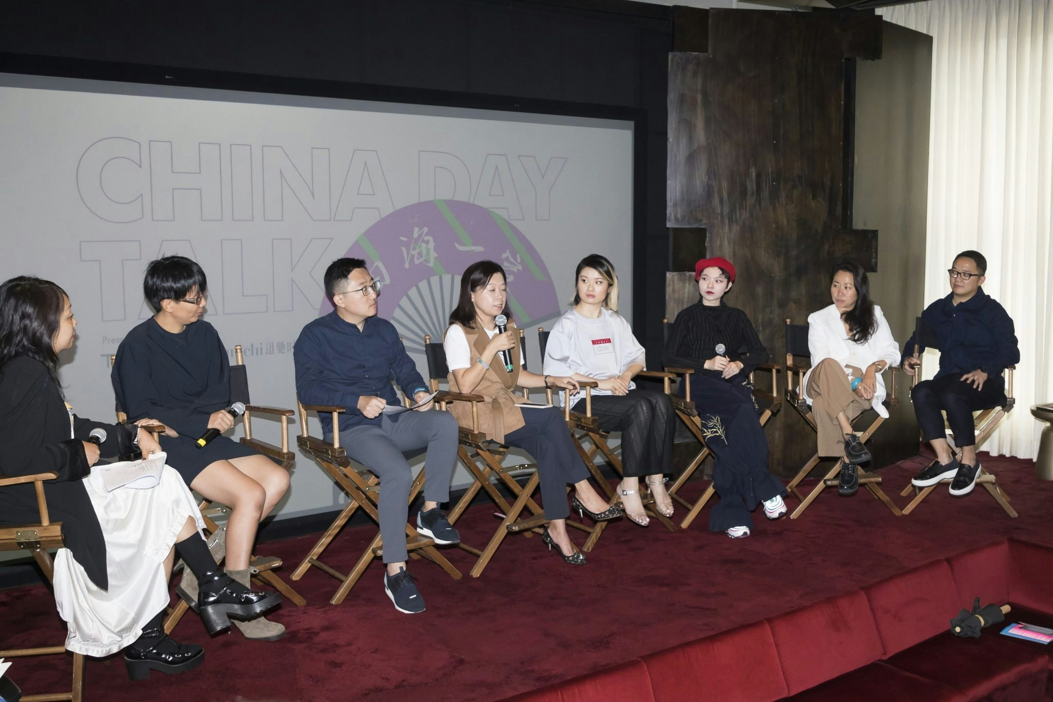 Tmall's panel discussion on Sunday's press conference. From left to right: Shawey Yeh from Nowness, Lin Li from JNBY, Bo Liu, President of Tmall Marketing and Operations, Jessica Liu, President of Tmall Fashion, Jieyi Liu, CEO and Founder of Particle Fever, designer Angel Chen, Wen Zhou, CEO of 3.1 Phillip Lim, and Paul Fang, Founder and CEO of Suntchi. Courtesy photo