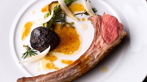 Roasted lamb with roquefort tart, baby onions, and rosemary. (Courtesy Photo)