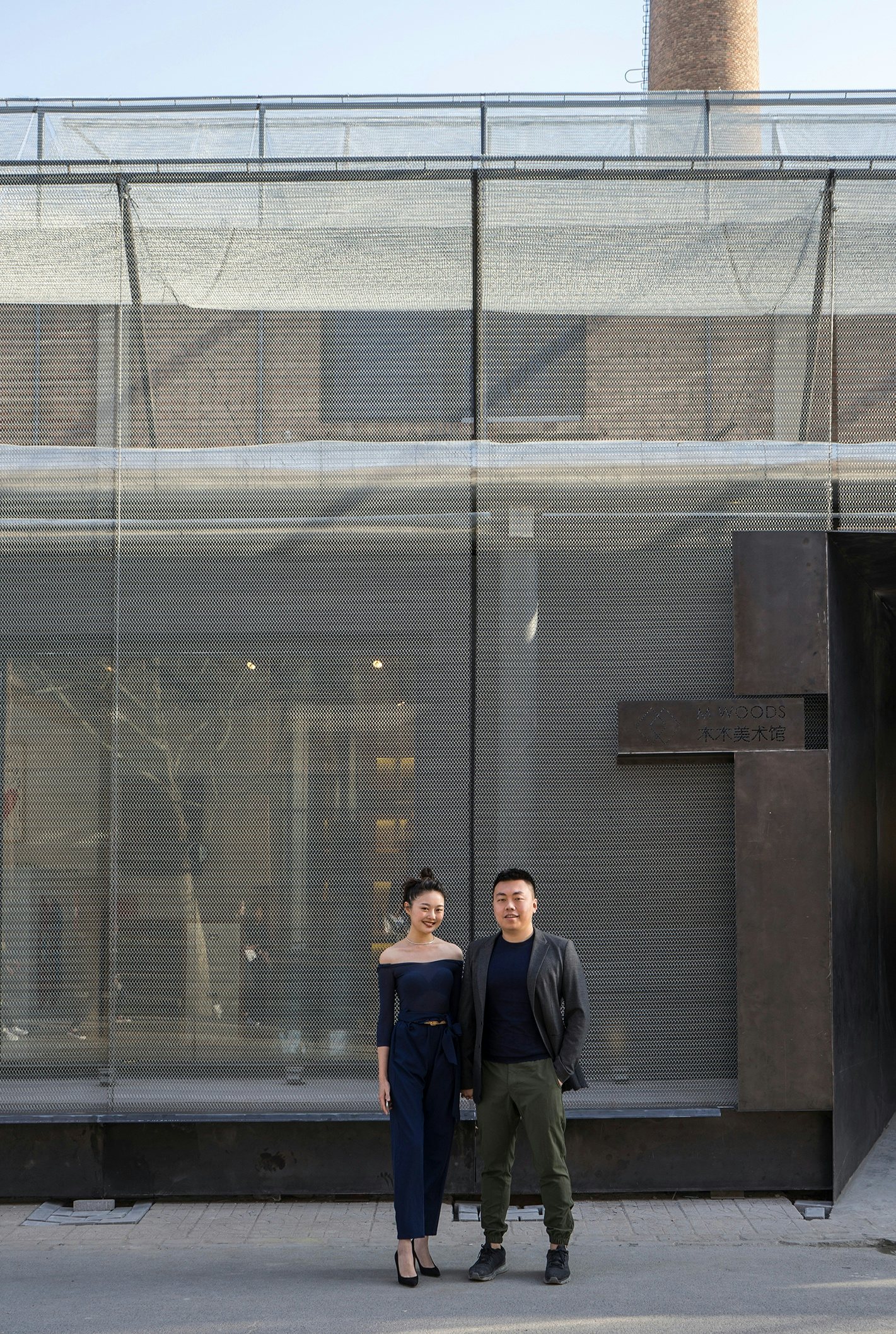 Wanwan Lei (L) and her husband Lin Han (R) in front of M WOODS. (Courtesy Photo)