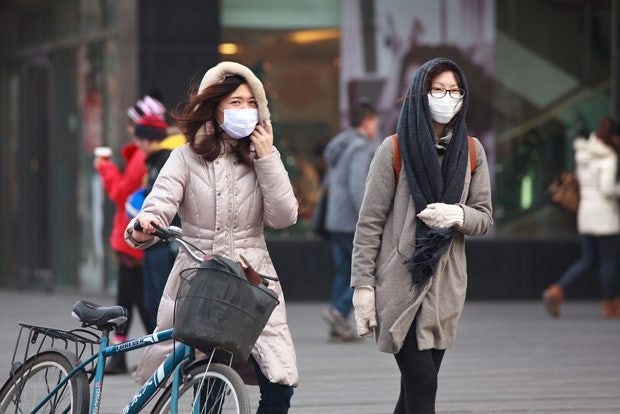 An exceptionally bad bout of "airpocalypse" hit many cities in China in January 2013, causing many people in China to scramble for air masks and air purifiers. (Shutterstock)