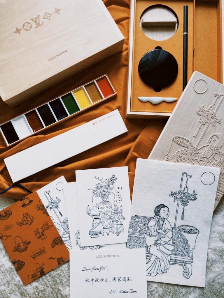 Louis Vuitton's Mid-Autumn Festival gift box in 2022 spotlighted Chinese woodcut watermarking. Photo: @JiWeiran