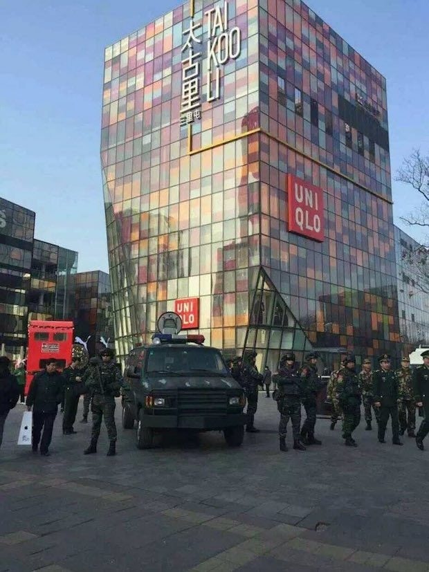 Paramilitary forces outside Uniqlo in an image circulated on WeChat.