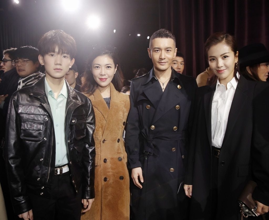Wang Yuan (left), Huang Xiaoming (second to right), and Liu Tao (right) attended Givenchy's runway show in Paris earlier this month. Photo: VCG