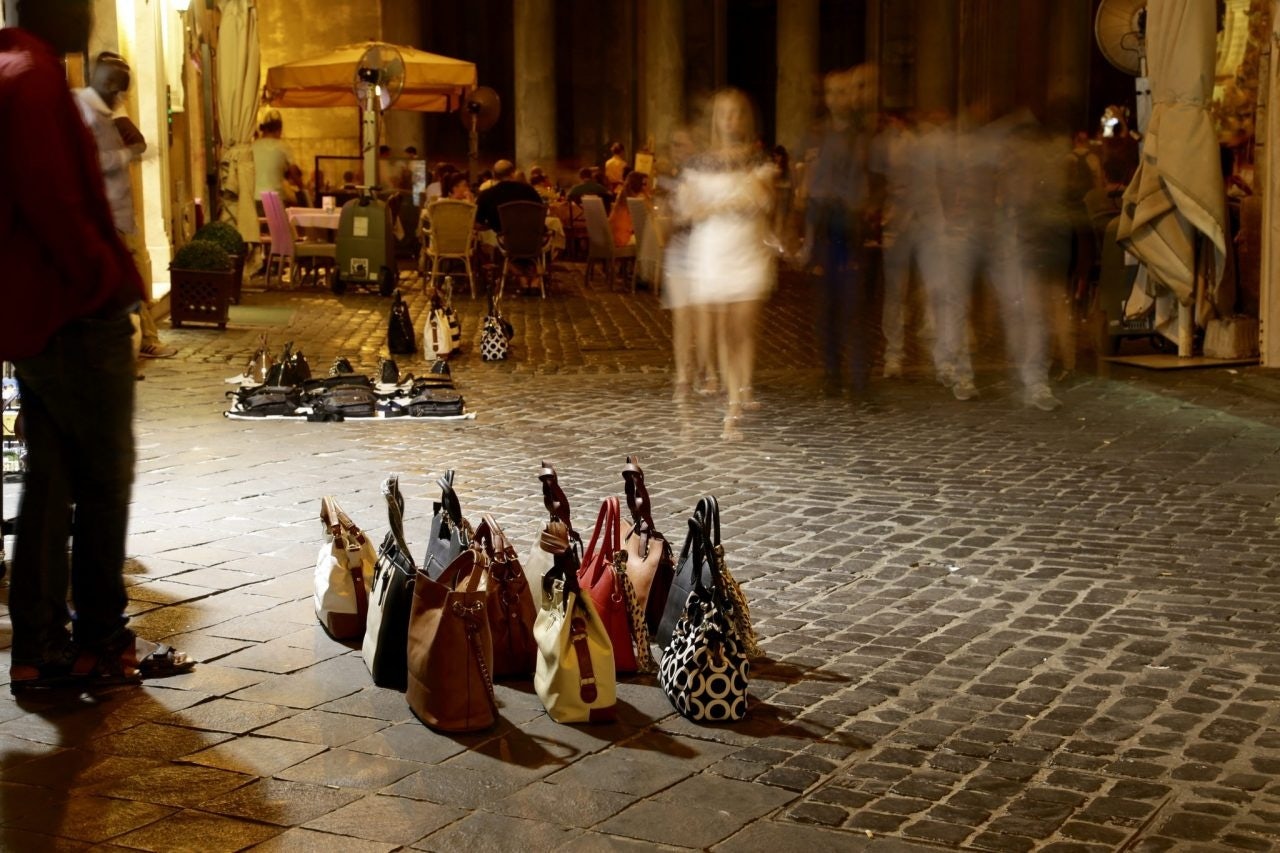 Rome, Italy - Street vendors pedal their imitation designer goods near the Pantheon. Photo: Shutterstock