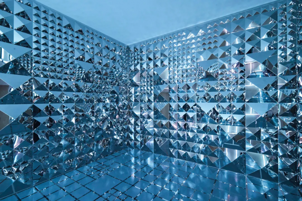The "Underground Club" space in the exhibition is surrounded by Valentino rivets. Photo: Valentino