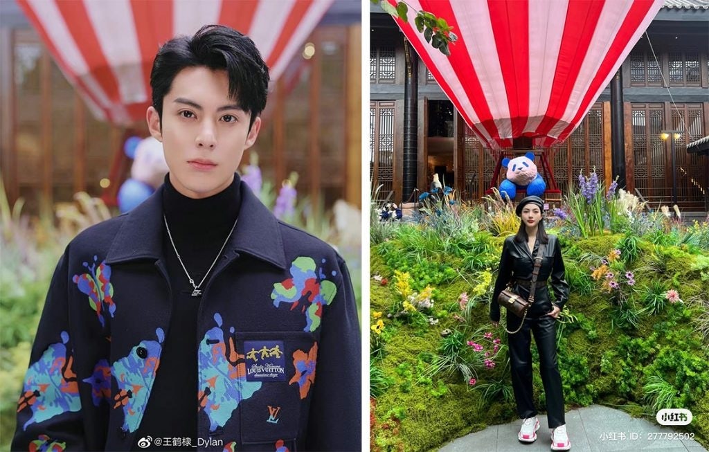 Guests, including Dylan Wang (left), are photographed in front of the restaurant's sculptures. Photo: Weibo/Xiaohongshu