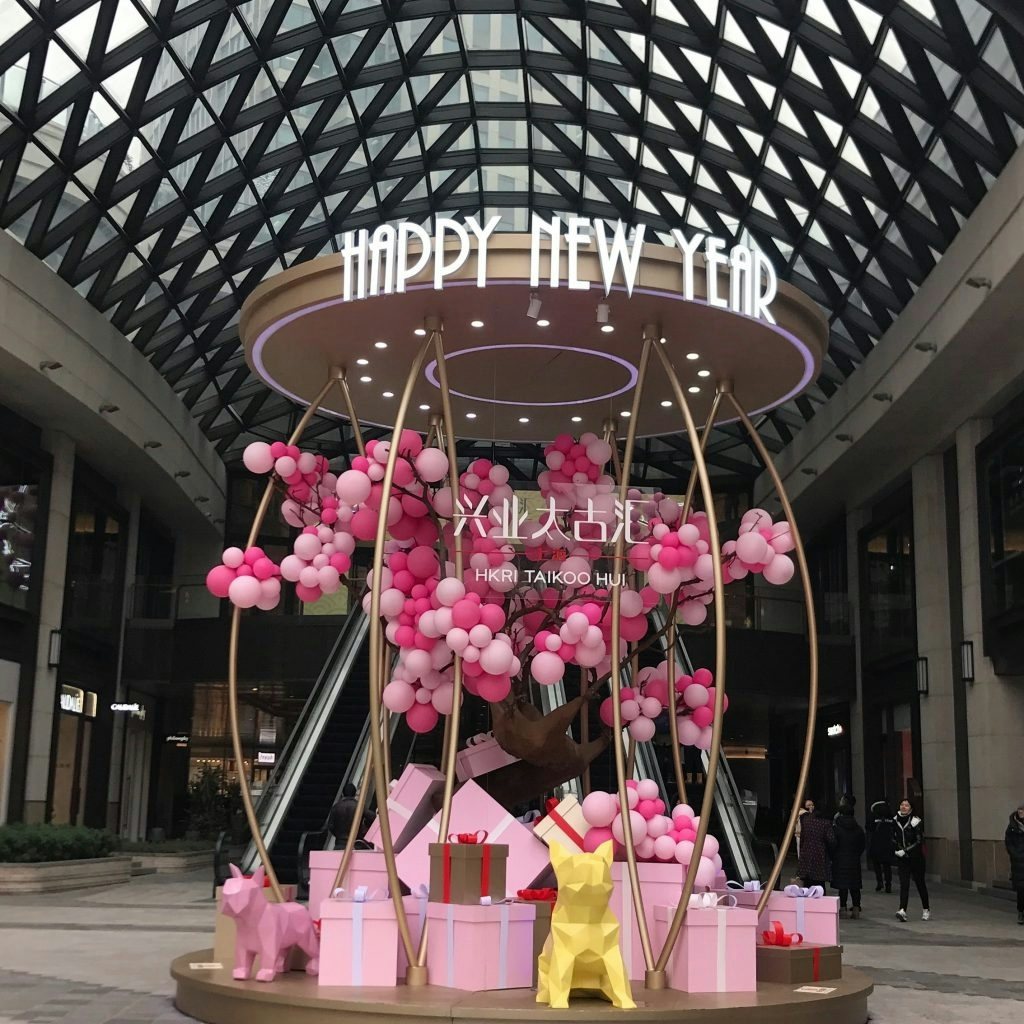 The "Happy New Year" statue outside of Taikoo Hui on Nanjing West Road. Photo courtesy: Zara Hoffman