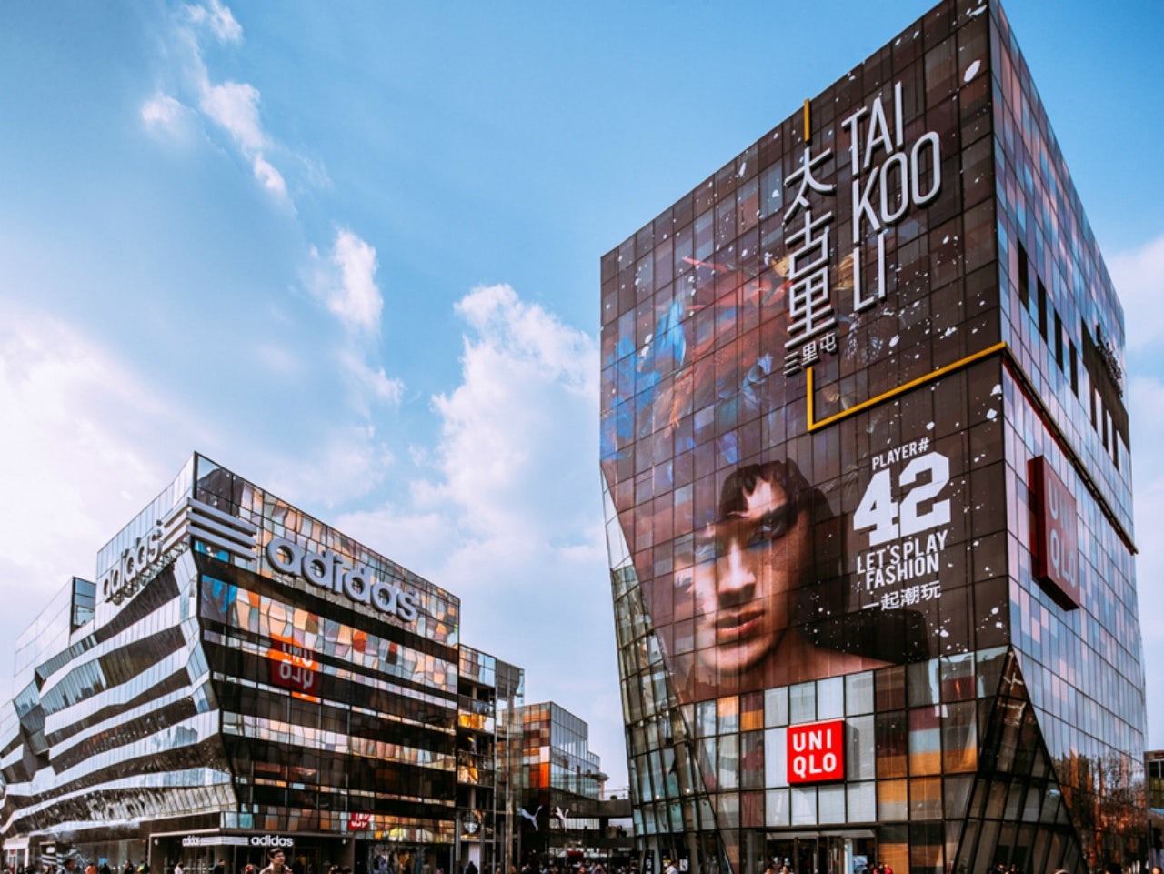 Taikoo Li's towering Uniqlo and Adidas stores are a landmark in the Sanlitun district. (Courtesy Photo) 