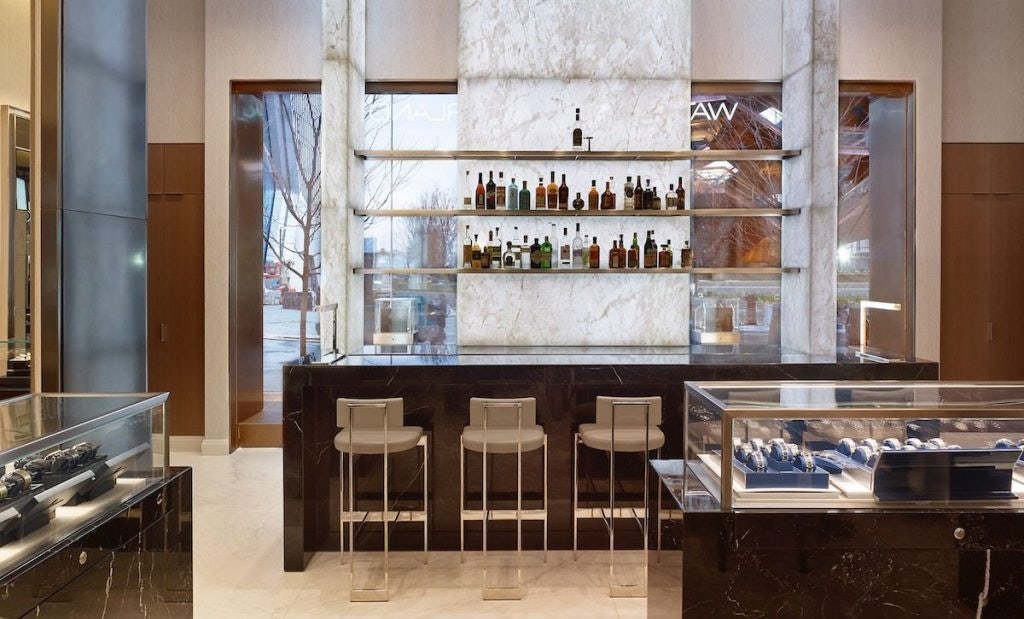 Watches of Switzerland's boutique in Hudson Yard features a full bar from cocktail institution Death amp; Company. Photo: Courtesy of Watches of Switzerland