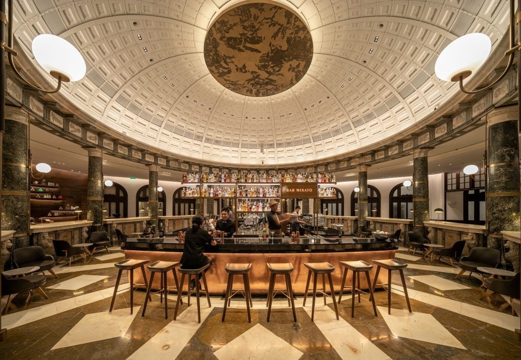 Starbucks' flagship in Tianjin reimagines the third place by rejuvenating a centuries-old heritage building and adding new features like the Starbucks Bar Mixato. Photo: Courtesy of Starbucks