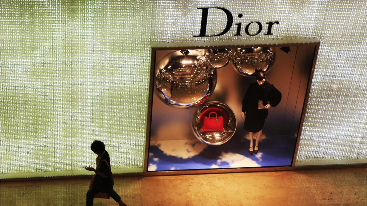 Heritage luxury brands, such as Dior, have balanced exclusivity and ubiquity by employing heritage marketing strategies. Photo: Humphery/Shutterstock