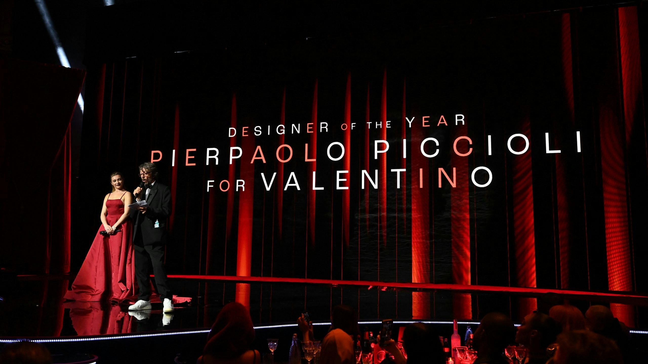 Florence Pugh presents the designer of the year award to Pierpaolo Piccioli for Valentino during The Fashion Awards 2022. Photo: Getty Images for BFC