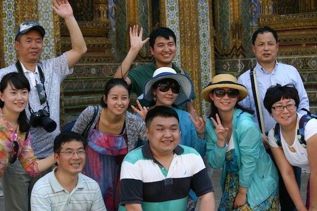 Chinese tourists at the Grand Palace in Bangkok, Thailand. (Jing Daily)