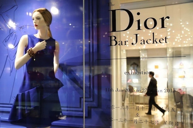 The exhibition recreates the atmosphere of a Parisian Dior boutique 