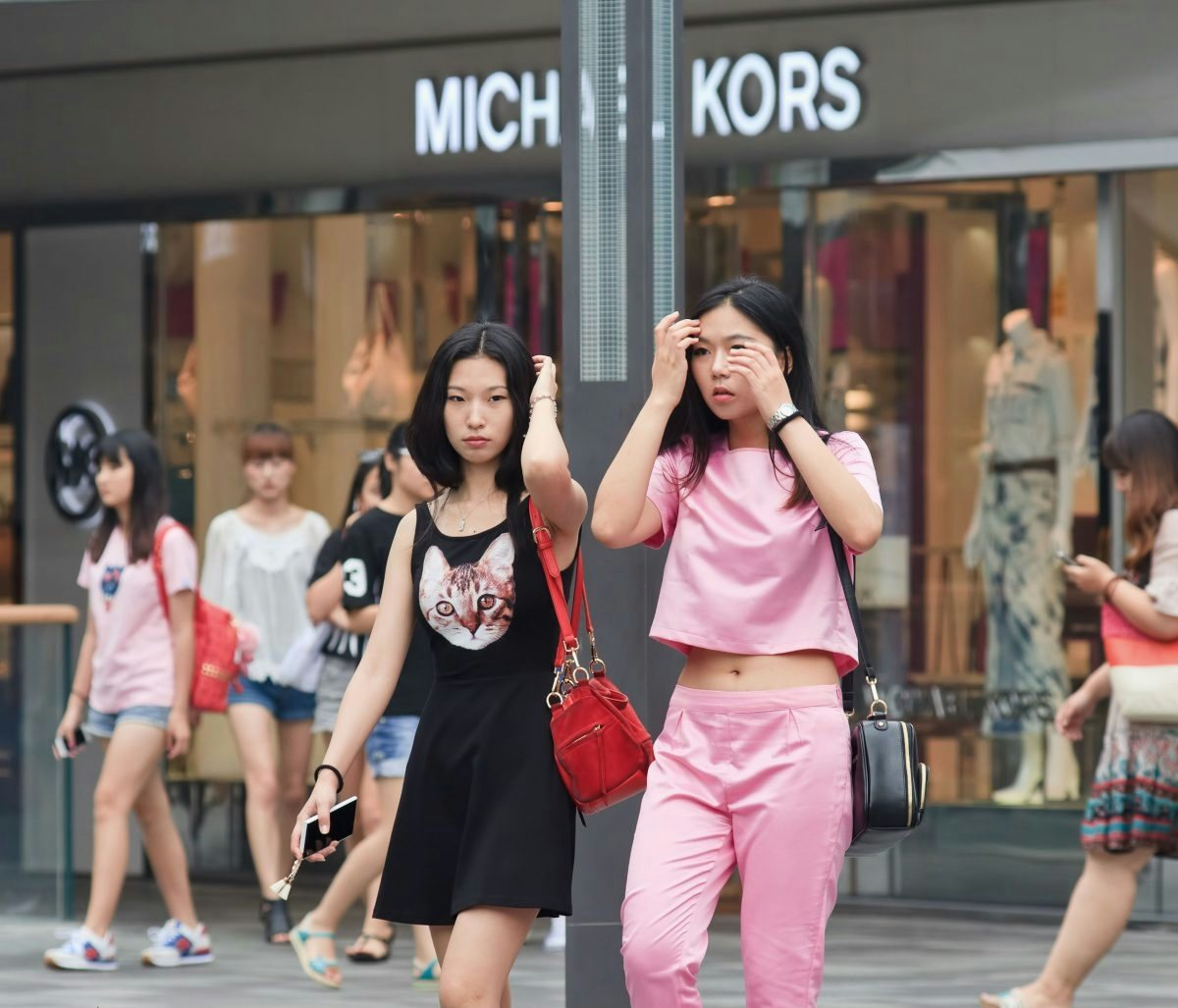 An increasing number of Chinese shoppers abroad are talking about accessible luxury brands on social e-commerce app "Red." (Shutterstock)