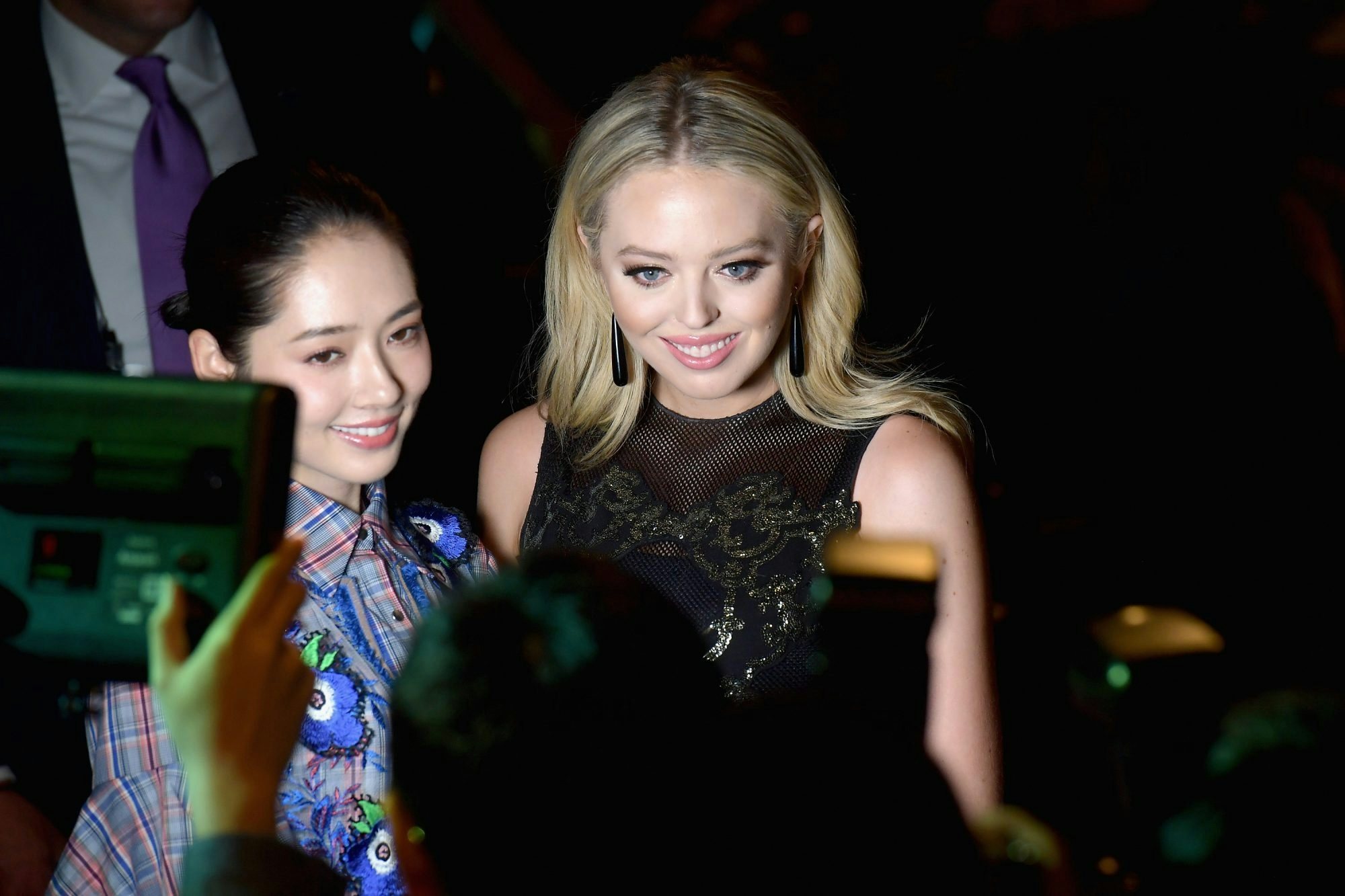 Tiffany Trump (R) attends the Vivienne Tam F/W 2017 runway show, taking a photo with Chinese actress Bea Ting Kuo (L). (Photo by Gustavo Caballero/Getty Images for Vivienne Tam)