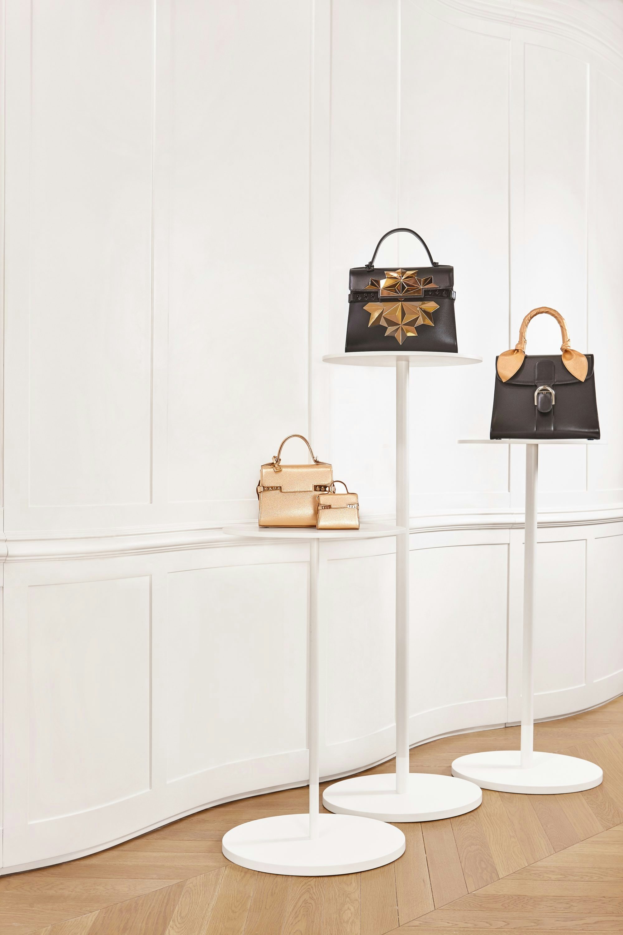 The gold starburst is a feature in Delvaux's end-of-year Poussière d’étoiles collection. (Courtesy Photo)