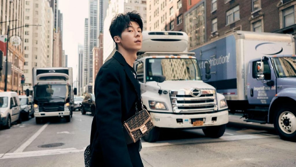 Chinese actor Xu Guanghan wears pieces from Fendi's Fall/Winter men's 2022 collection. Photo: Fendi
