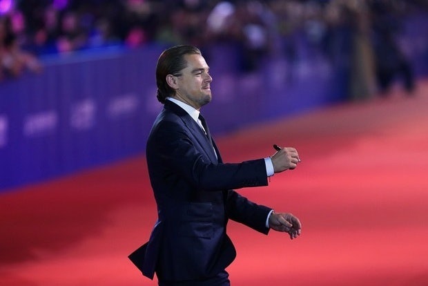 Actor Leonardo DiCaprio walks the red carpet at Dalian Wanda's unveiling of its massive new film studio in Qingdao, which it says will be the world's largest. (Reuters) 