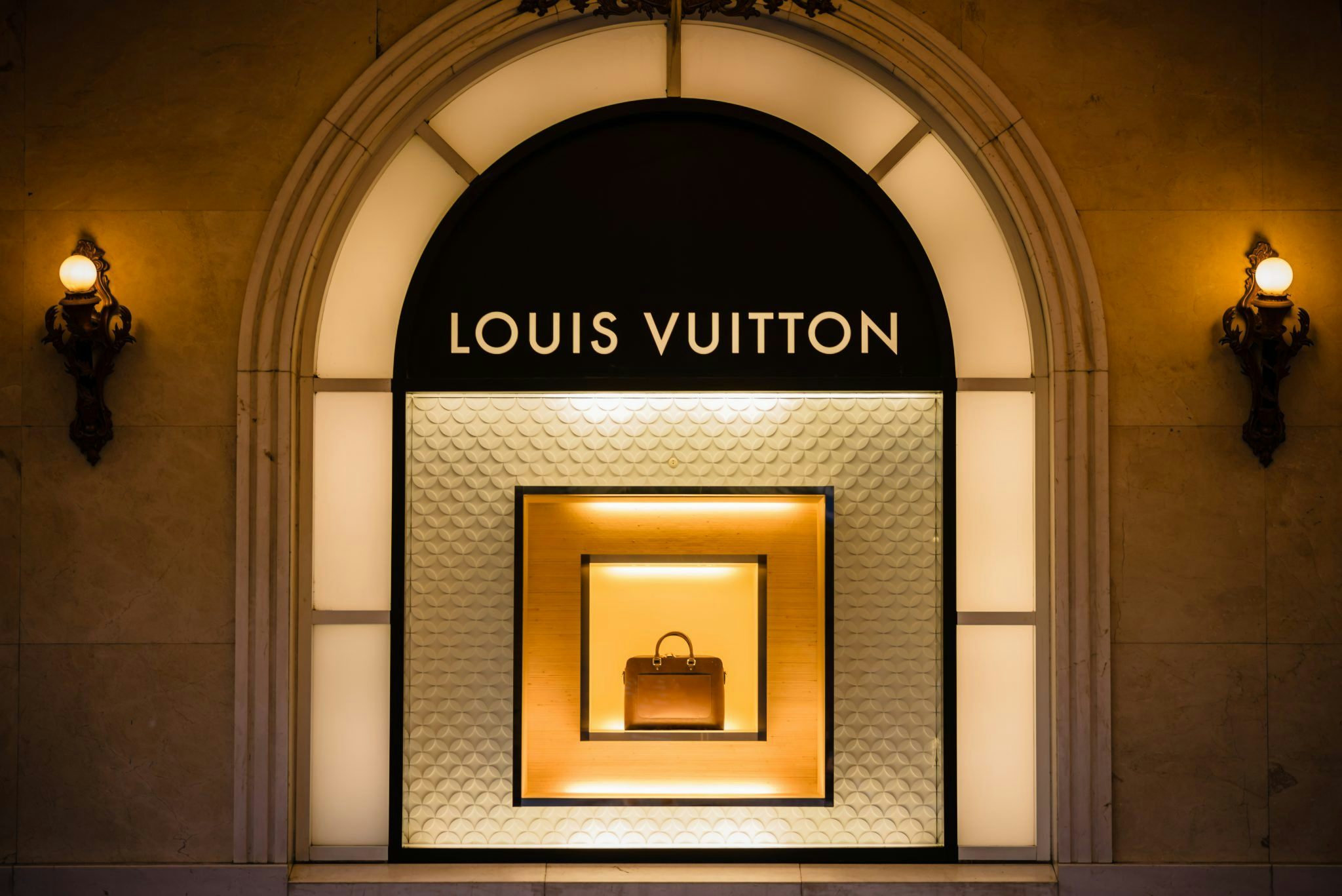 Louis Vuitton Cuts Prices in China As Gov't Seeks to Boost Luxury Buying