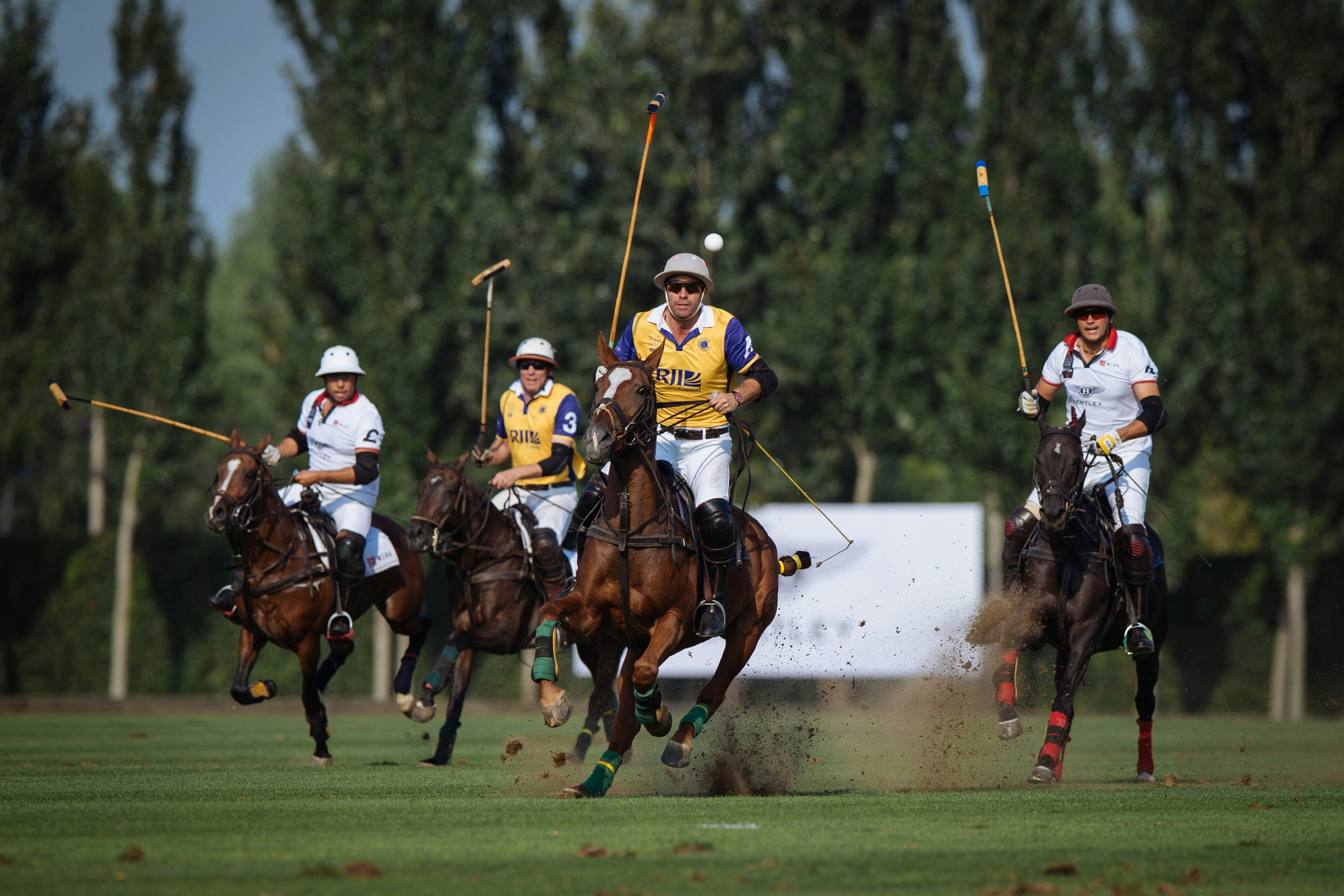 The RJI Capital Commonwealth ream competes with the Bentley Tang Polo Club team at British Polo Day 2016 in Beijing. (Sam Churchill)